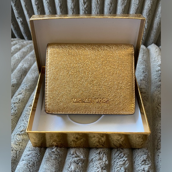 Michael Kors Handbags - NWT Michael Kors gold wallet